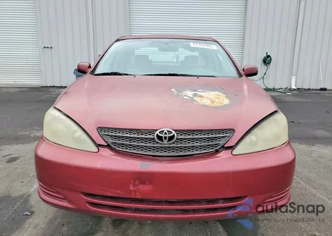 2003 Toyota Camry Le z USA, uszkodzony, nr VIN 4T1BF30K93U054643